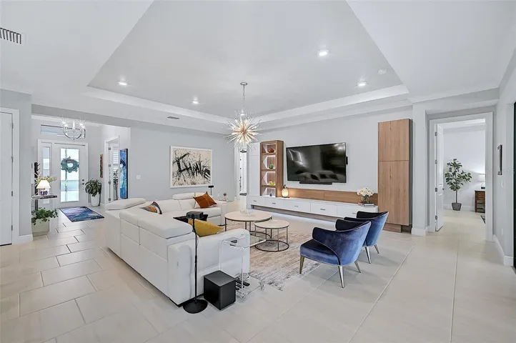 Living Rm with added lighting & Custom Cabinets