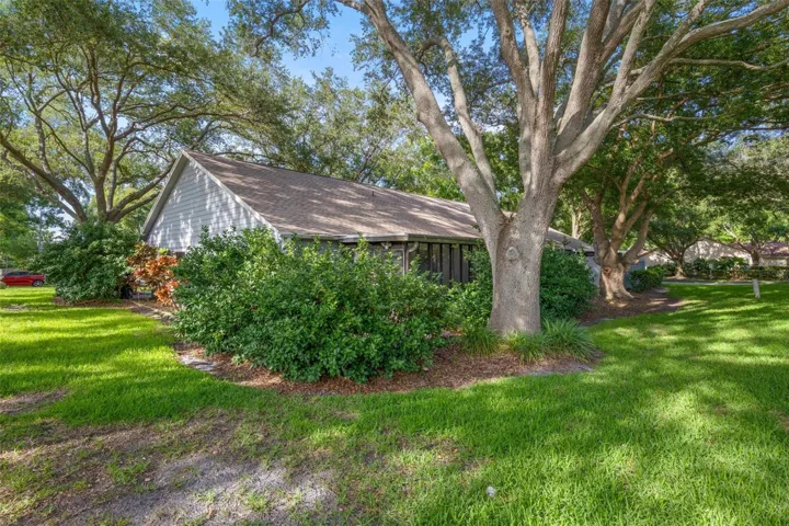 Beautifully landscaped, tree-filled lot.