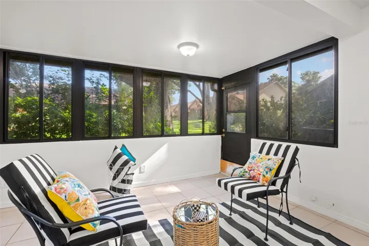 Spacious screened outdoor porch with beautiful views.