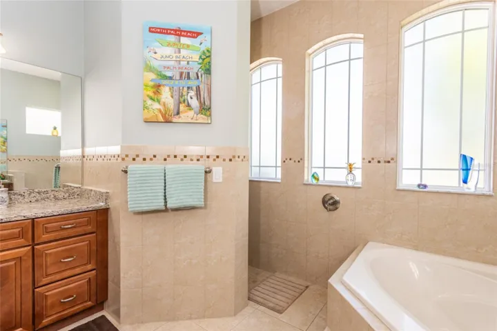 Primary bathroom with plenty of natural light