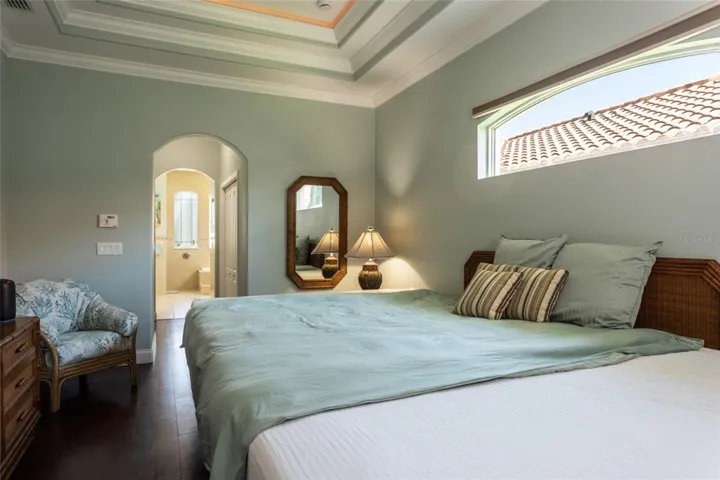 Primary bedroom with transom window