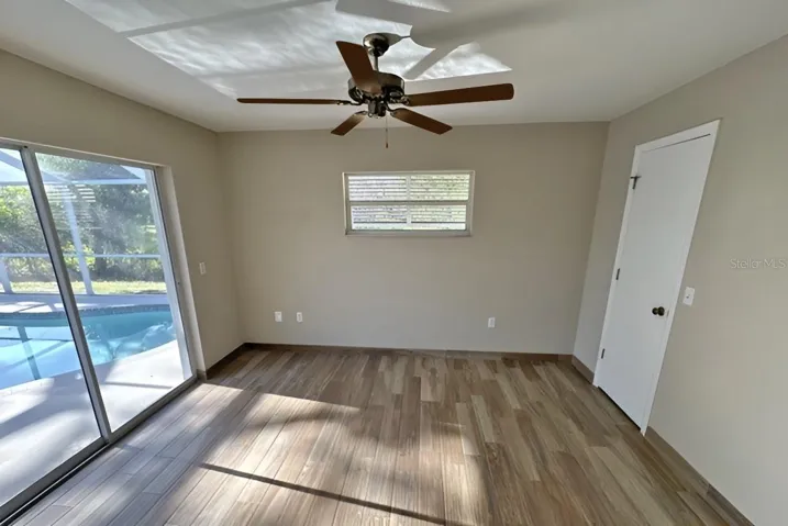 bedroom 3 also has sliders to pool area and walk in closet