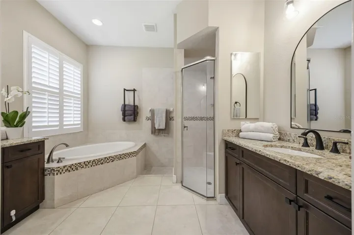 Main floor primary  ensuite bath with private water closet.