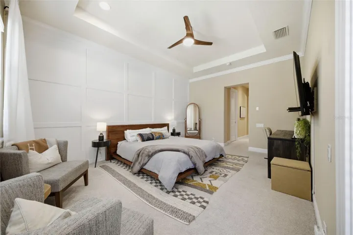 Main floor primary suite with two large walk in closets.
