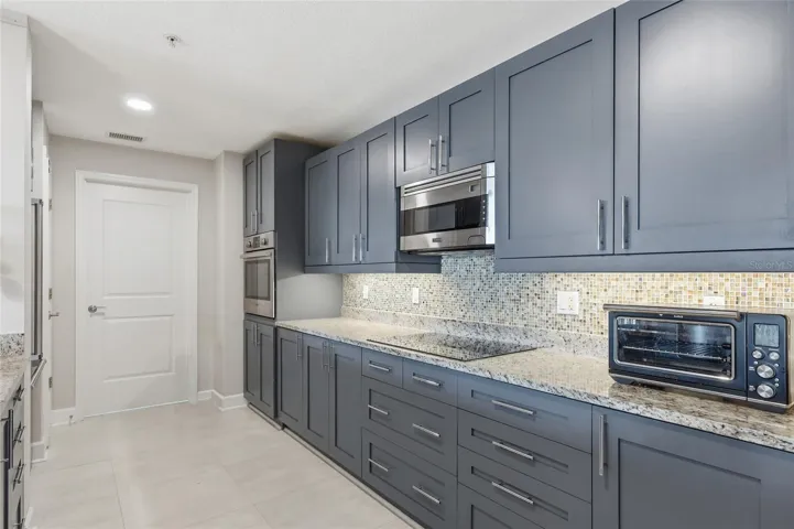 Open kitchen with granite counter tops