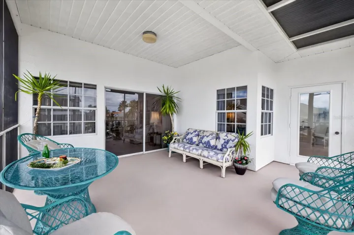 Upper waterfont balcony from main living room and primary