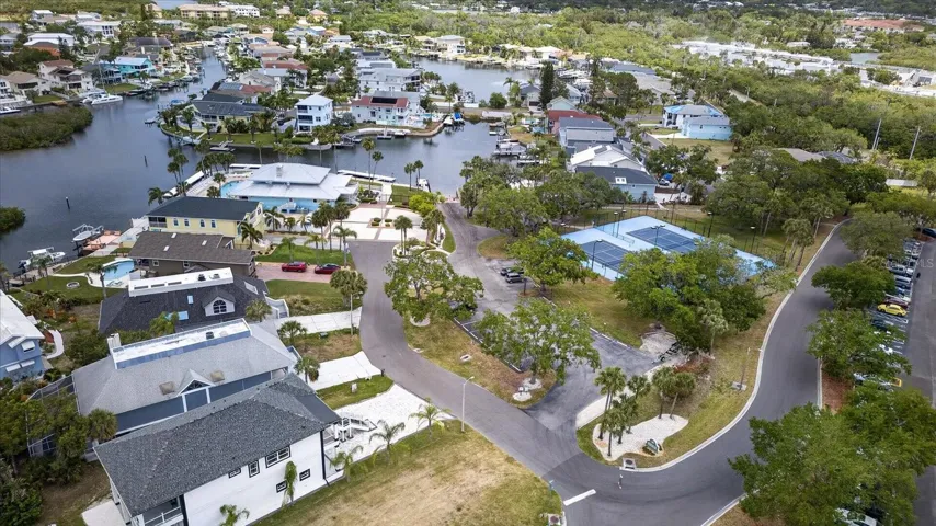 Gulf Landings Clubhouse, tennis courts, pool, docks and sauna.