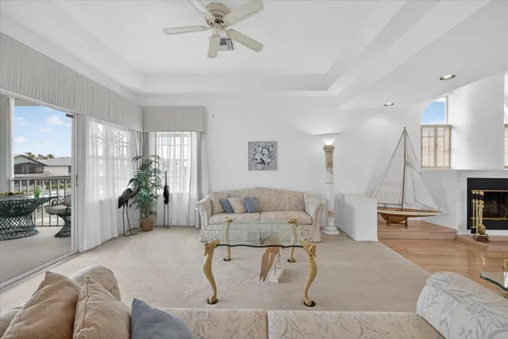 Main living room on upper floor with water views.