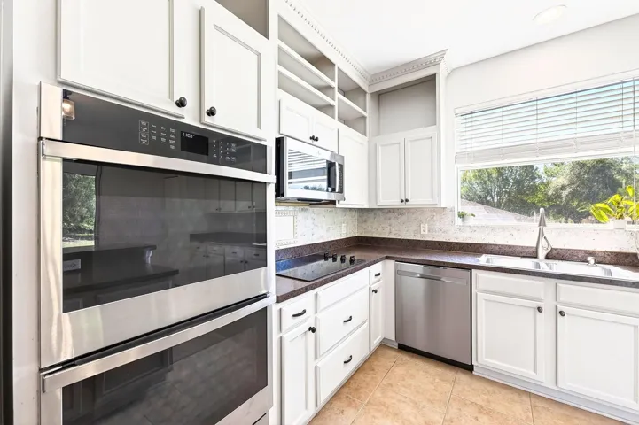 Built-in/stainless steel appliances.