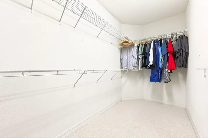 Primary suite walk-in closet.