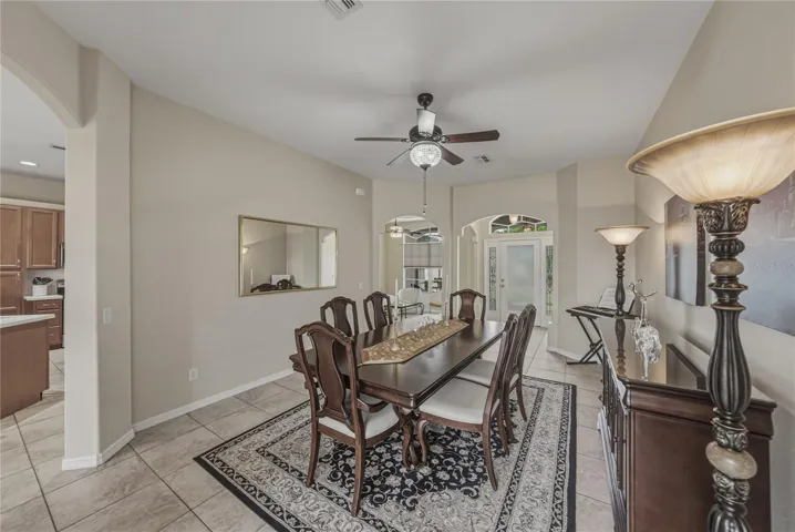 An elegant front-facing dining room that sets the tone for memorable gatherings the moment you walk in.