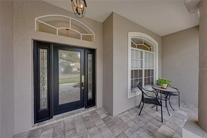 Welcoming front patio ready for your morning coffee.