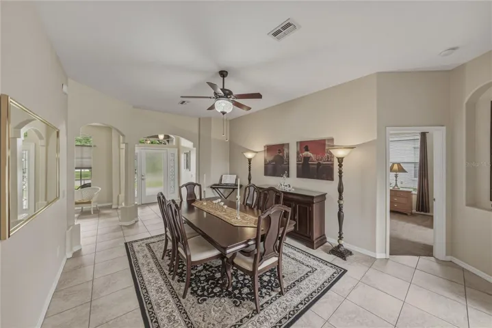 An elegant front-facing dining room that sets the tone for memorable gatherings the moment you walk in.