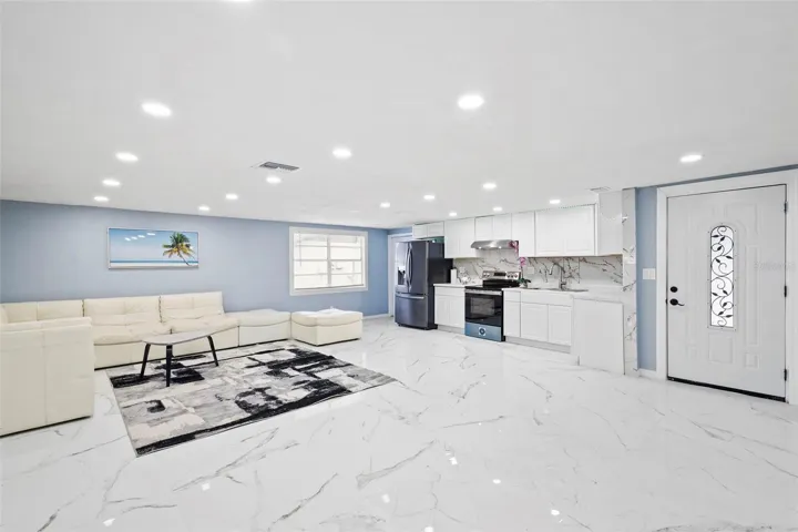 LIVING ROOM, DINING , KITCHEN AND ENTRANCE