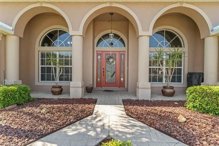 Archways enhance your entrance. A perfect spot to enjoy the sunrise