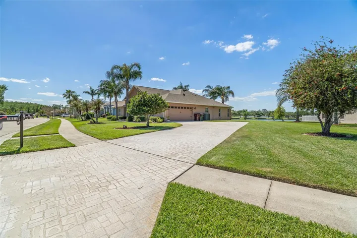 Extra long and wide paver driveway welcomes you home