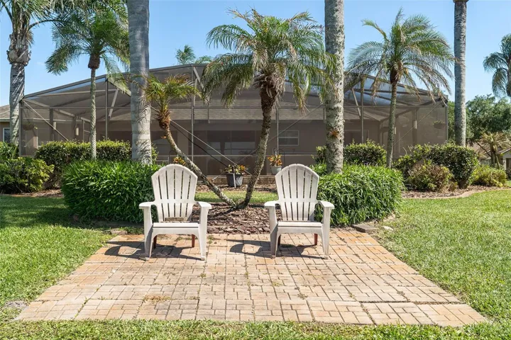 An added paver seating area to enjoy the pond view