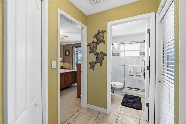 Pool bath leads to lanai