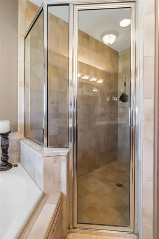 Separate tiled shower w/bench