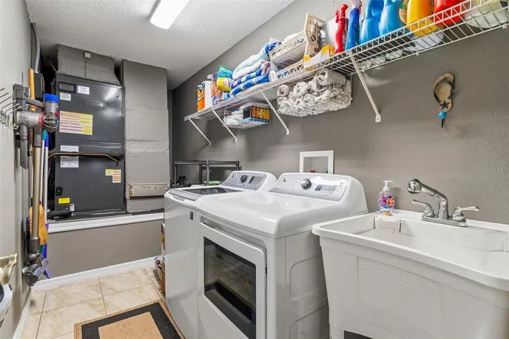 Laundry room to include washer/dryer and sink
