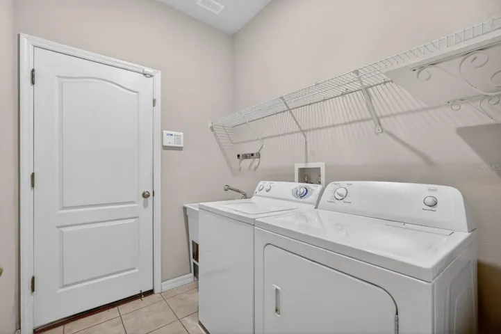Laundry room with sink