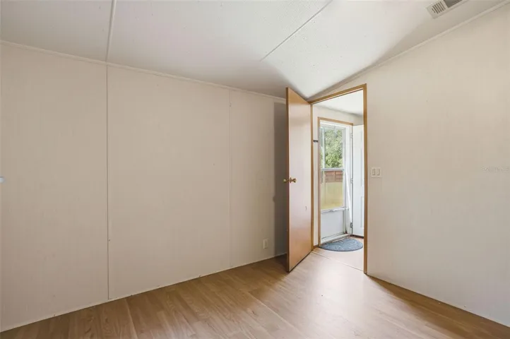 Primary Bedroom near Front Entry with Large Closet and Ensuite Bathroom in 2/2 Manufactured Home Built in 2006