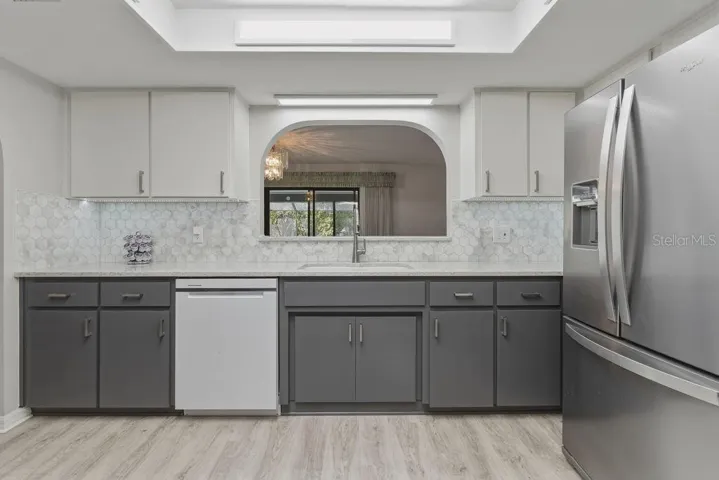 Kitchen with passthrough window to Dining