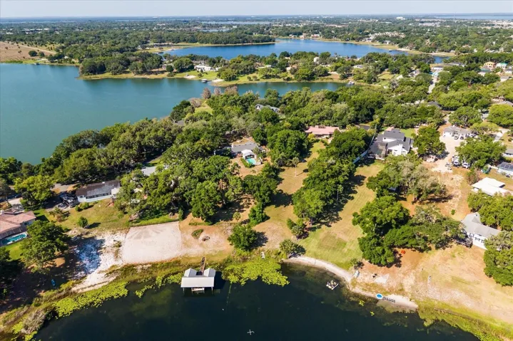 Front of house faces E Crooked Lake