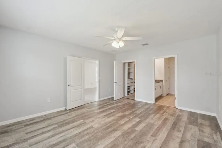 Primary suite with huge custom closet.