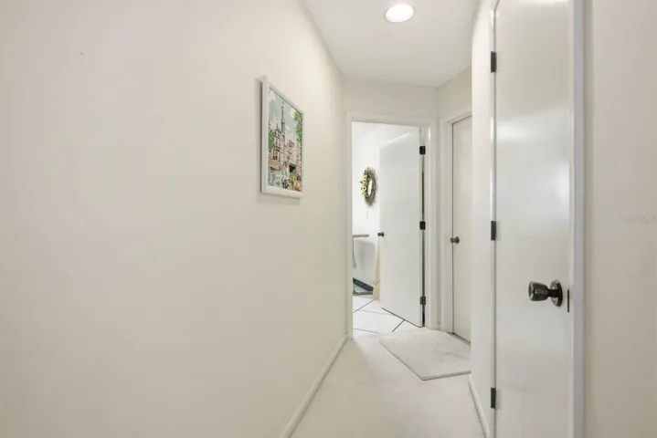 Hallway to Storage closet, Laundry and 3 car garage