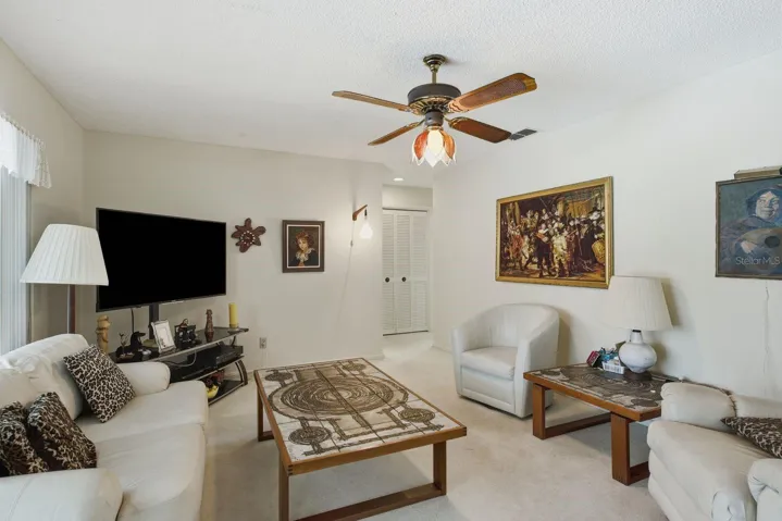Family room with entry to Guest bedroom and Pool bath