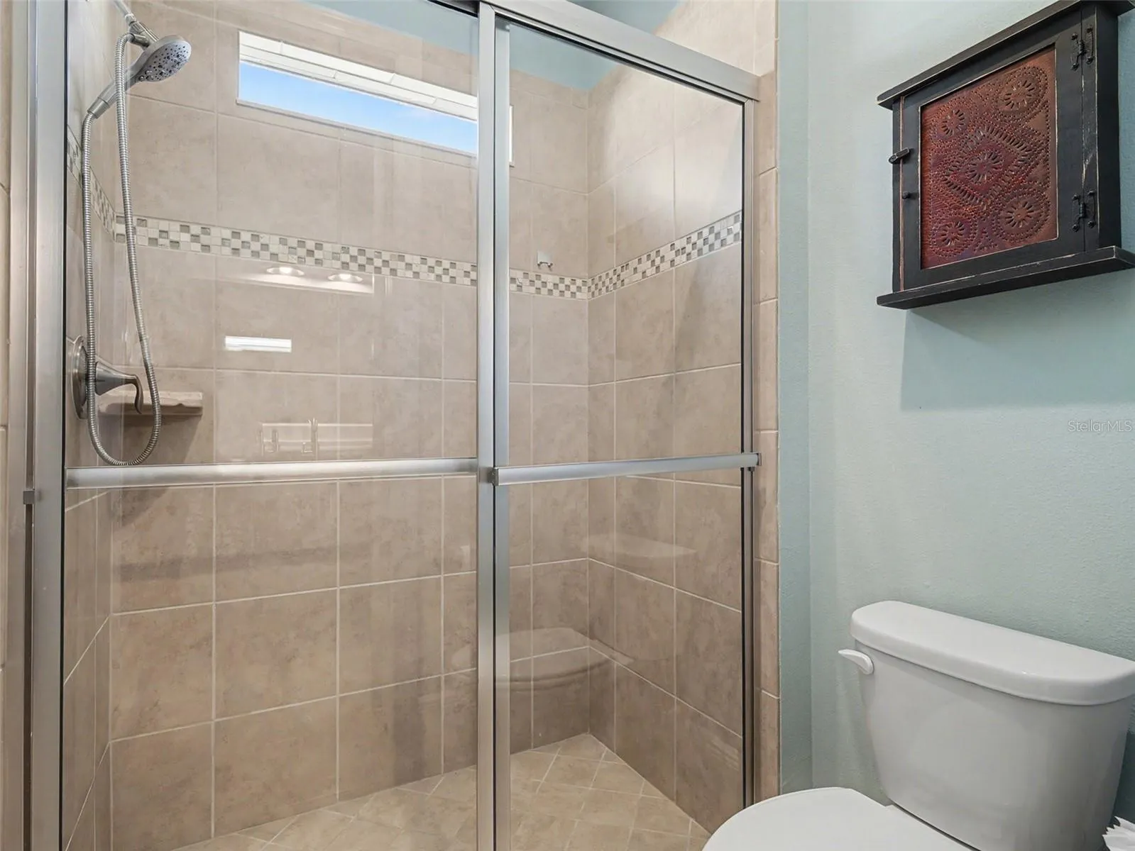 Guest bathroom with walk in shower and clean, modern finishes designed for comfort and convenience.