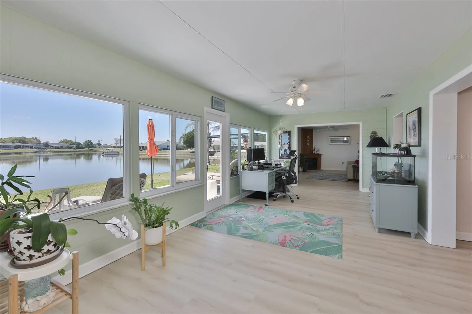 Enclosed Lanai-Newer Windows &amp; Door, Tons of Light &amp; Peaceful Lake Views