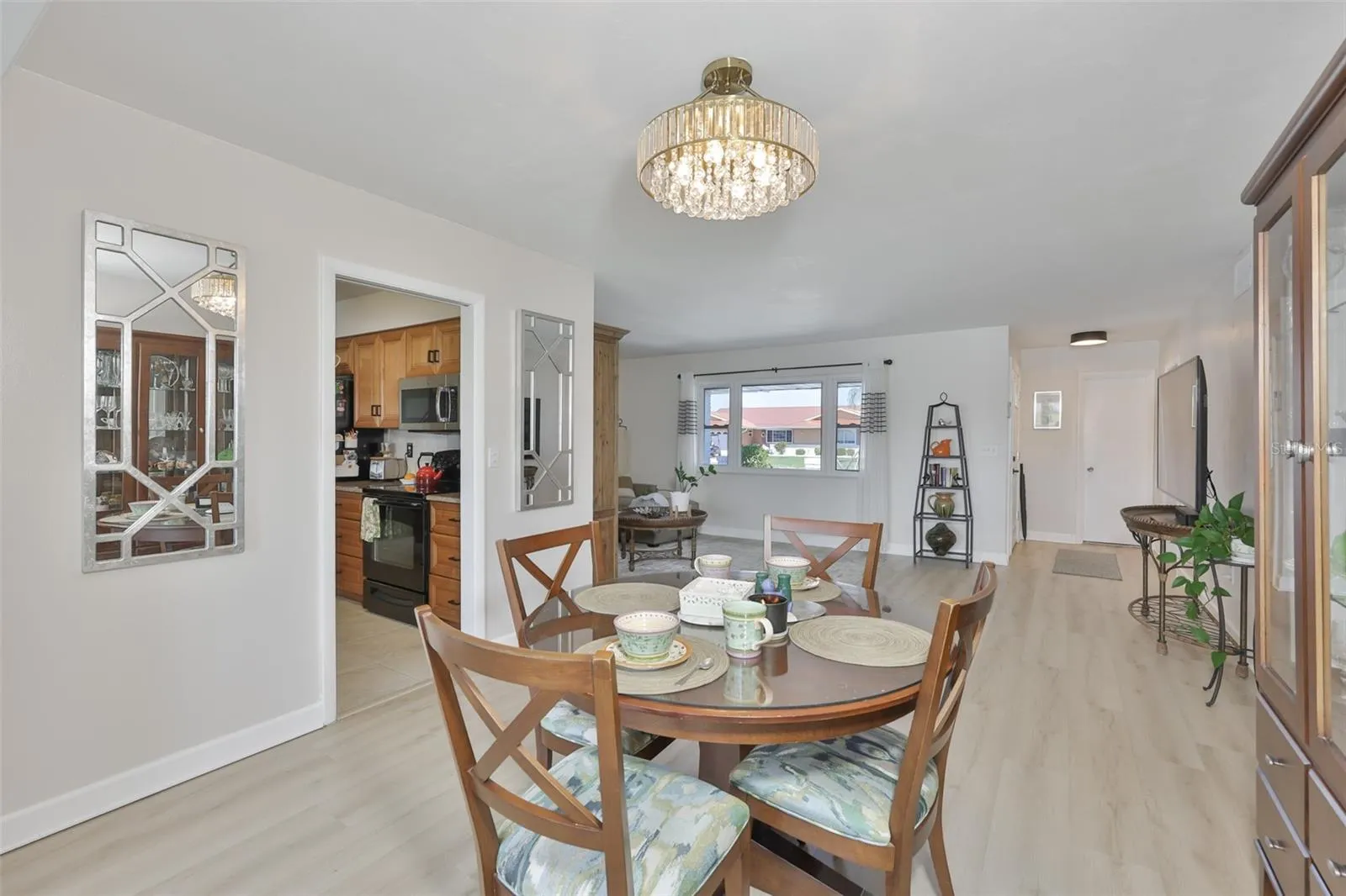 New LVT Plank Flooring Throughout Main Living Area, Updated Fans &amp; Fixtures, Light &amp; Bright Color Scheme, Fantastic South Lake Water View