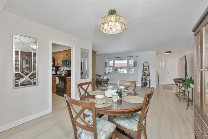 New LVT Plank Flooring Throughout Main Living Area, Updated Fans & Fixtures, Light & Bright Color Scheme, Fantastic South Lake Water View