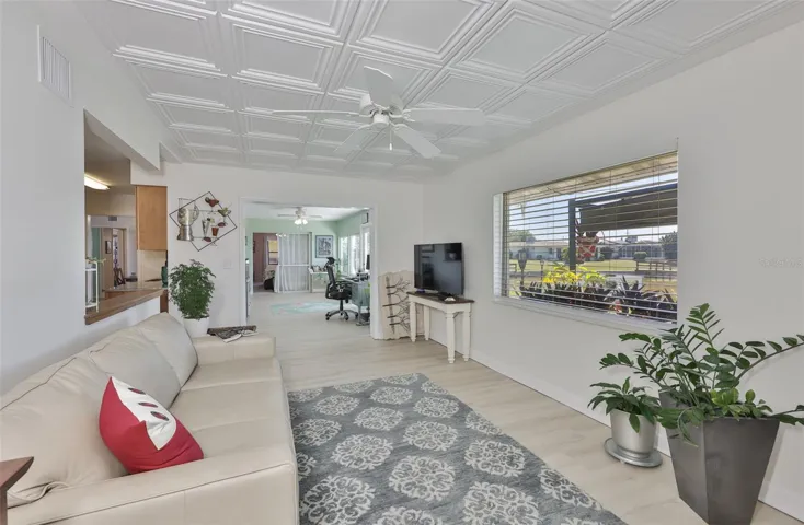 Great Room, Classic Elegant Coffered Ceiling & Electric Fireplace, Breathtaking Lake View, Plenty of Room for Entertaining Family & Friends