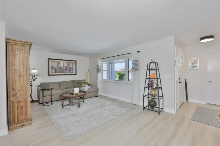 Front Living Room, Modern LVT Plank Flooring Throughout Main Living Area