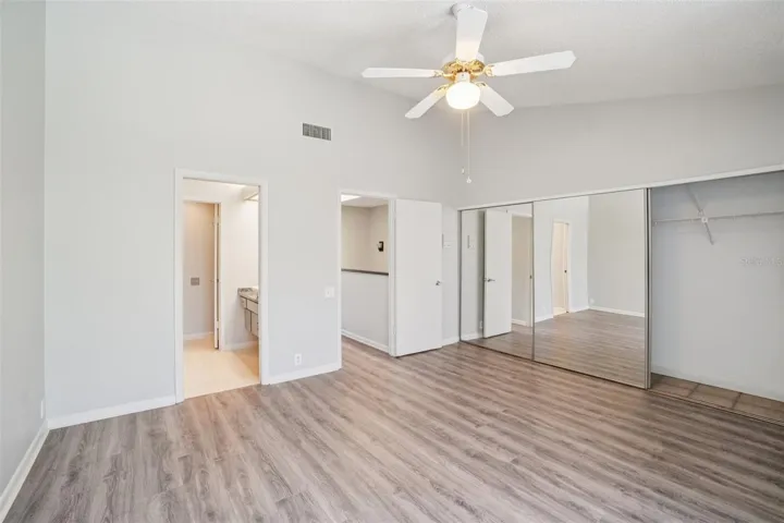 SPACIOUS PRIMARY BEDROOM OVERLOOKS BACK YARD