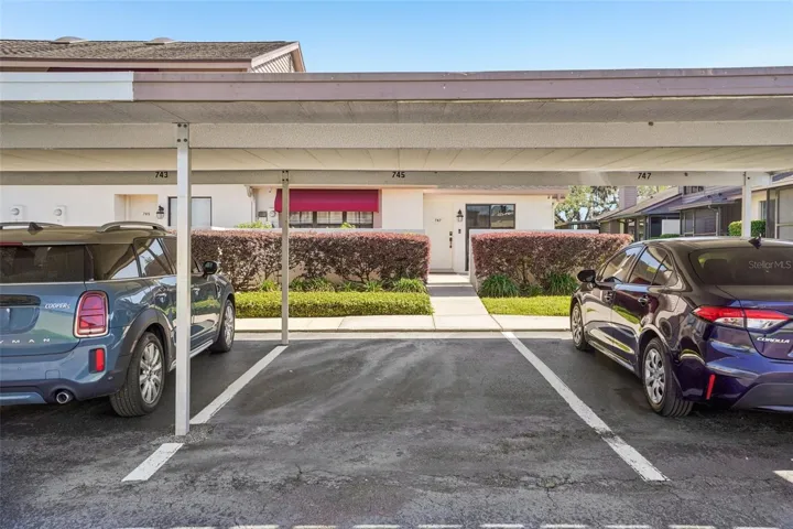 ASSIGNED COVERED PARKING SPACE CONVENIENTLY LOCATED IN FRONT OF THE UNIT
