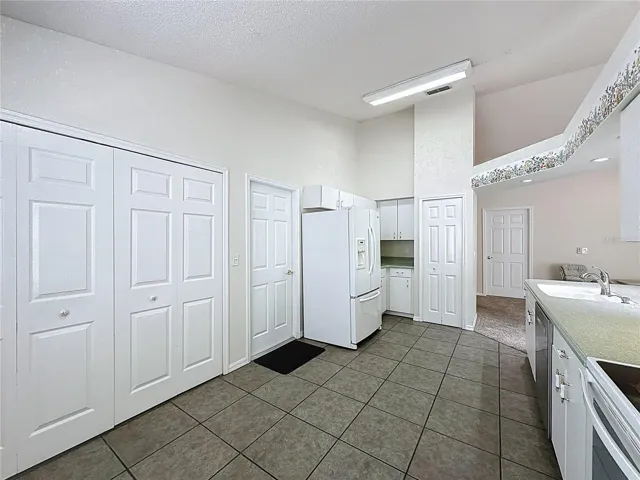 The washer and dryer are behind the doors