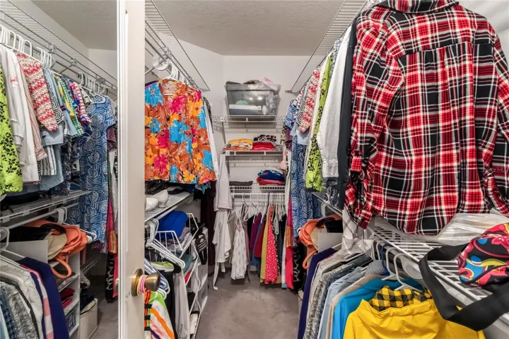 Primary walk in closet.