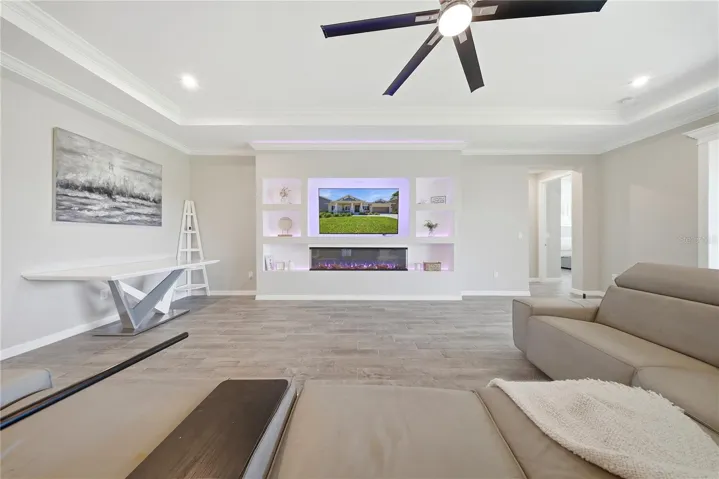 FAMILY ROOM WITH BUILT IN FIREPLACE WALL