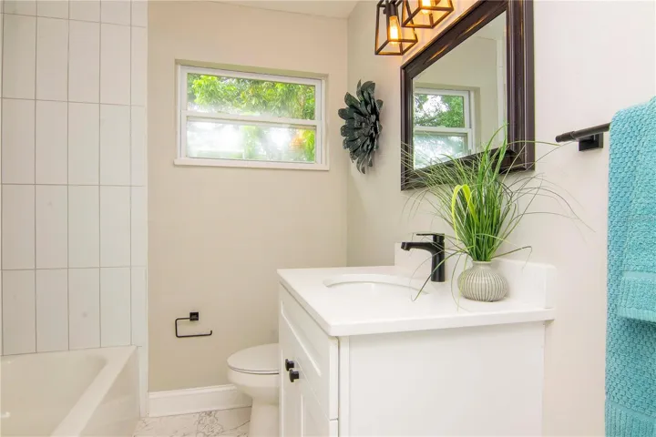 guest bathroom with tub