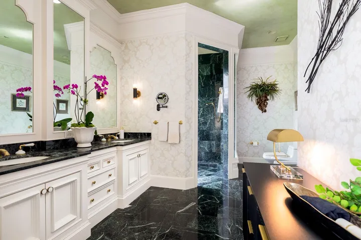 Dual sink cabinets, MARBLE counters & a BIDET and don't forget the enormous walk-in closet.