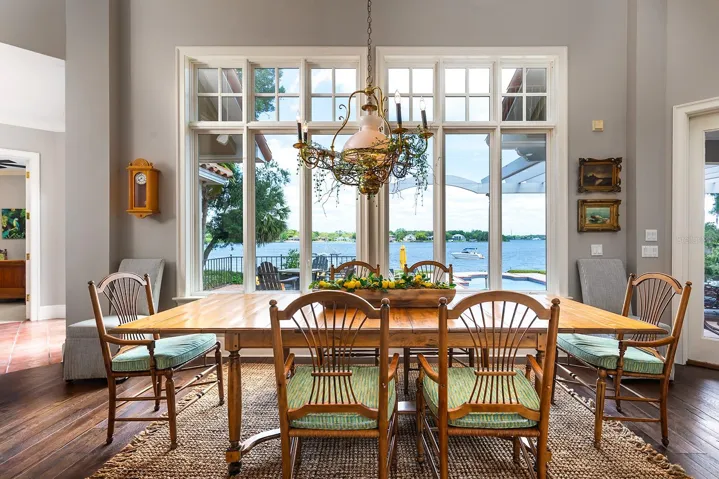 SUN DRENCHED lighting pours in as it illuminates this custom home.