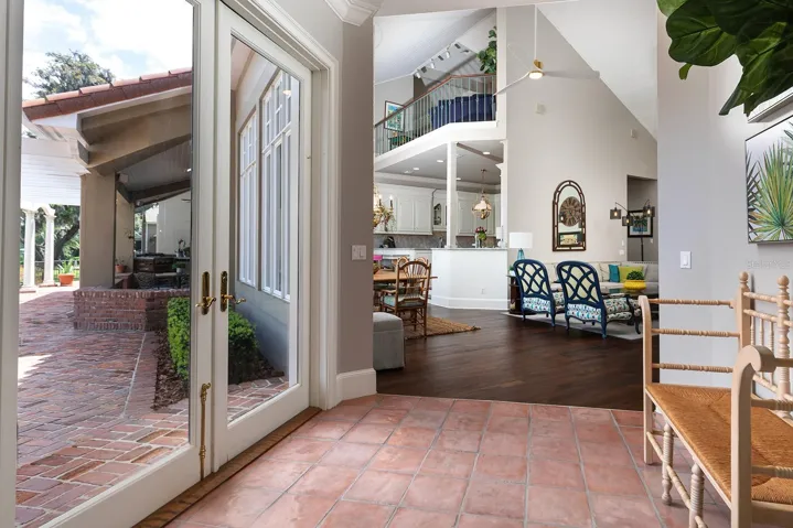 Additional foyer off the main living area and right outside one of the bedrooms and bath suites.