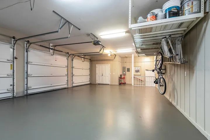 Oversized 3 car garage with more storage space and side entry from the house.