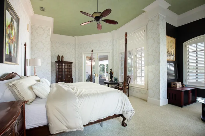 Stunning pool and water views from your expansive master bedroom/ sitting room.