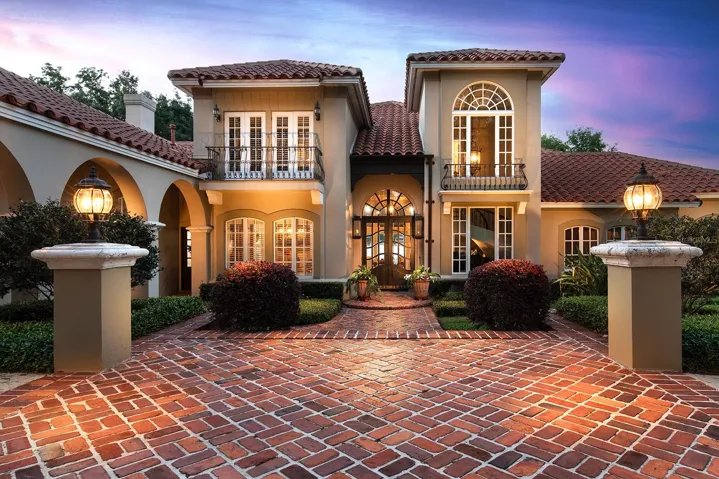When the sunsets the home is illuminated by warm and inviting lighting coming from the residence and landscaping. It is all designed to welcome you home day or night.