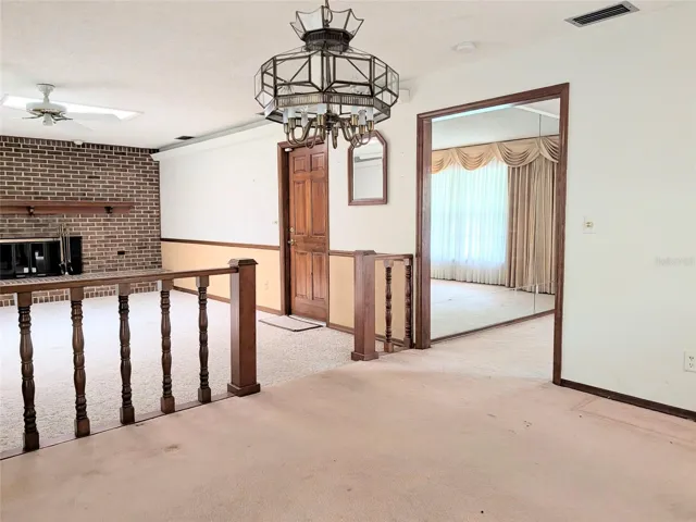 view from dining room to family room & front living room